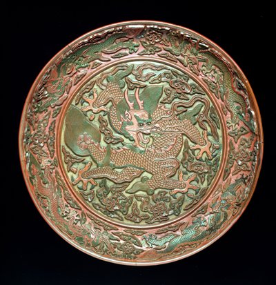 Circular dish decorated with nine dragons, Ming dynasty, Jianjing period by Chinese School